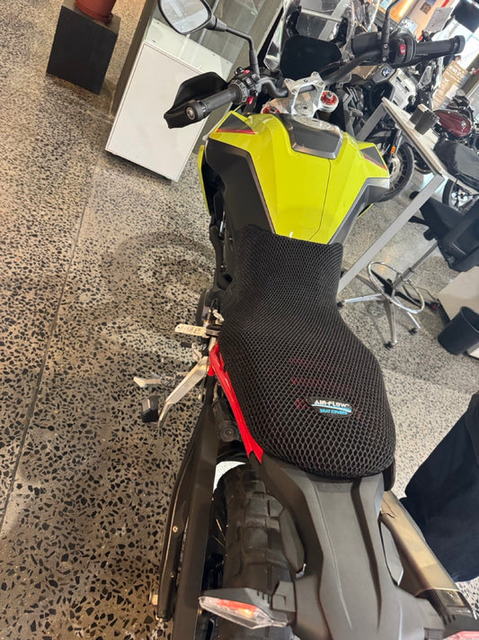 Air-Flow Seat Covers black 3D mesh seat cover fitted on a BMW GS adventure motorcycle, brand label visible